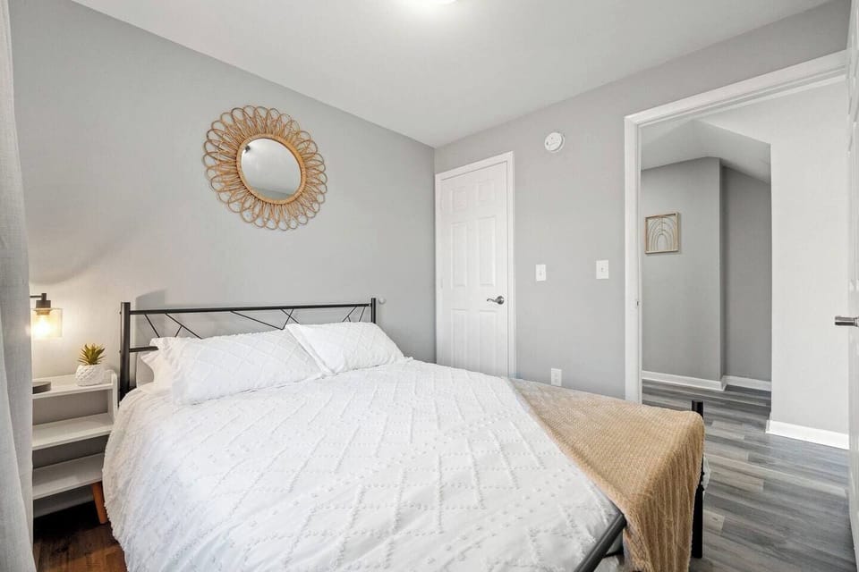 Spacious bedroom with a relaxing ambiance, designed for ultimate comfort and peaceful rest.