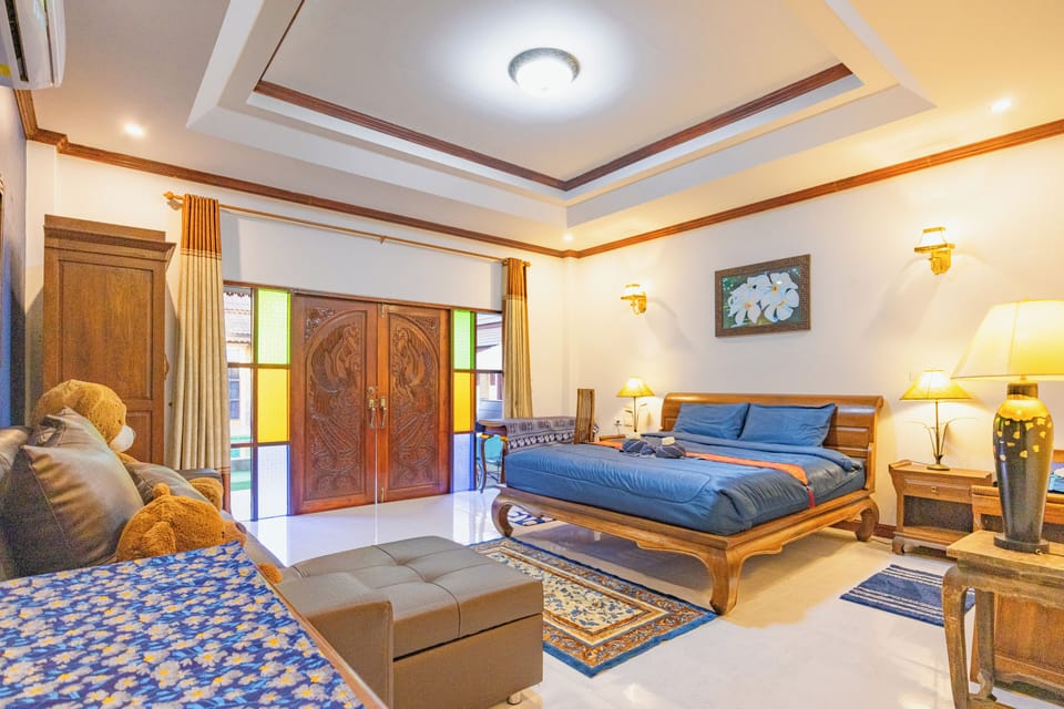 Family Room, 1 King Bed with Sofa bed, Non Smoking, Pool View | Desk, laptop workspace, iron/ironing board, free WiFi