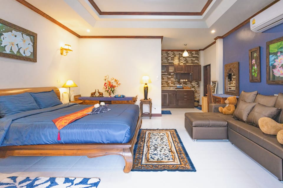 Family Room, 1 King Bed with Sofa bed, Non Smoking, Pool View | Desk, laptop workspace, iron/ironing board, free WiFi