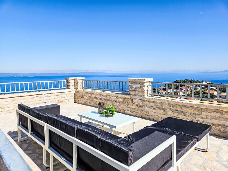 Apartment, Sea, Resort, Balcony, Ocean, Coast, Outdoor Furniture, Shade, Hotel, Handrail