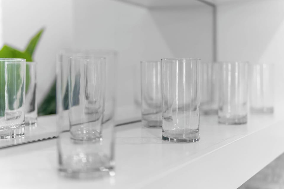Glassware neatly arranged, perfect for wine nights or casual drinks.