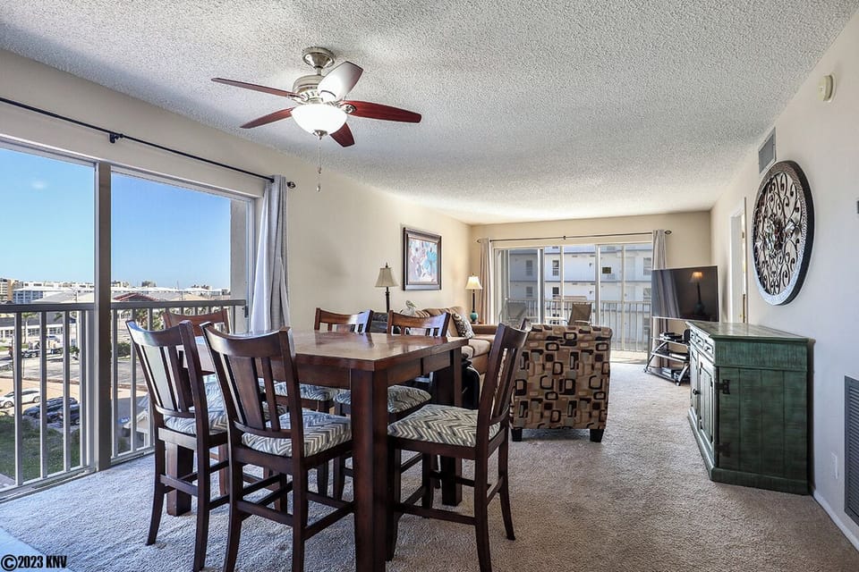 This corner condo offers beautiful views of the island from nearly every room