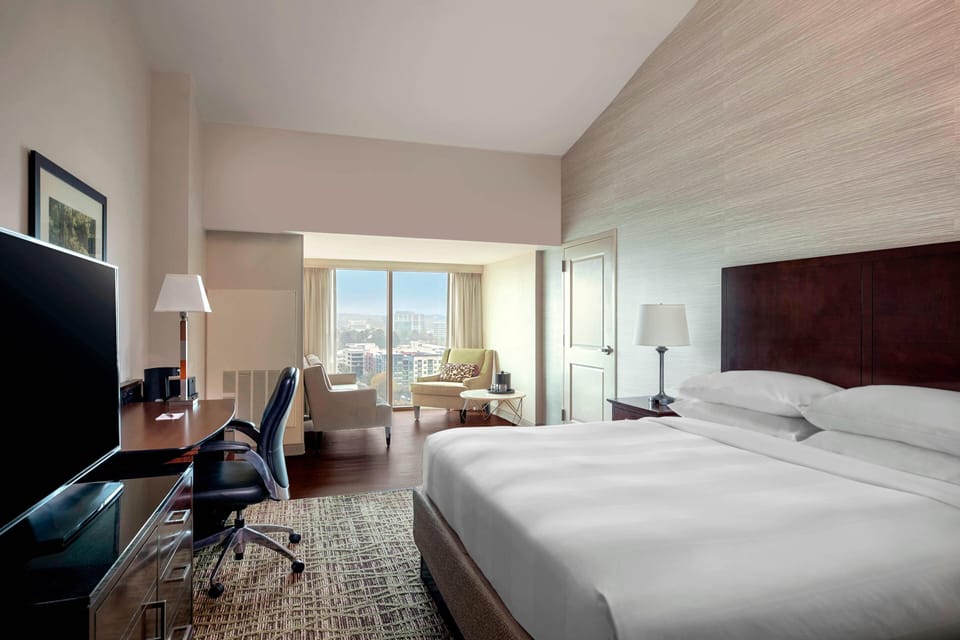 Premium bedding, down comforters, desk, laptop workspace