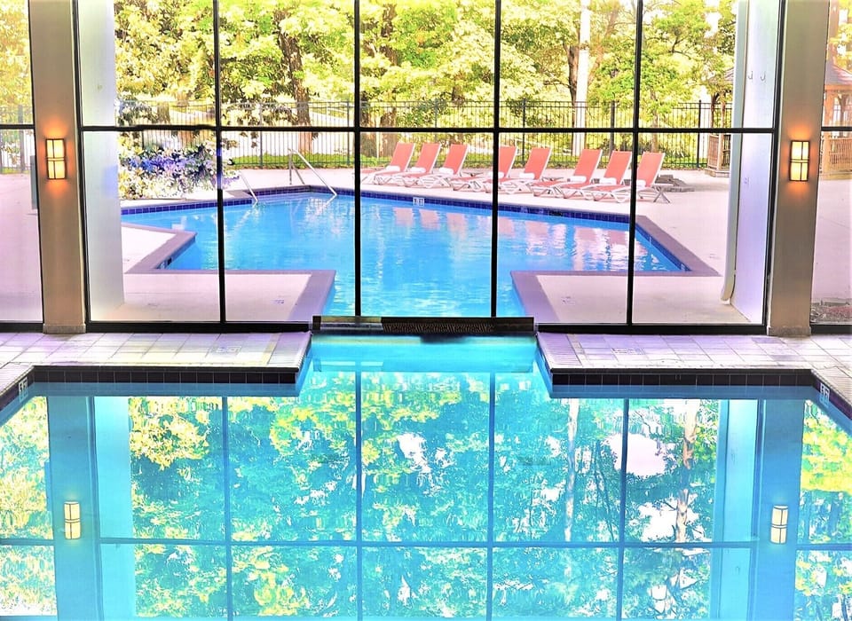 Indoor pool, seasonal outdoor pool, pool umbrellas, sun loungers