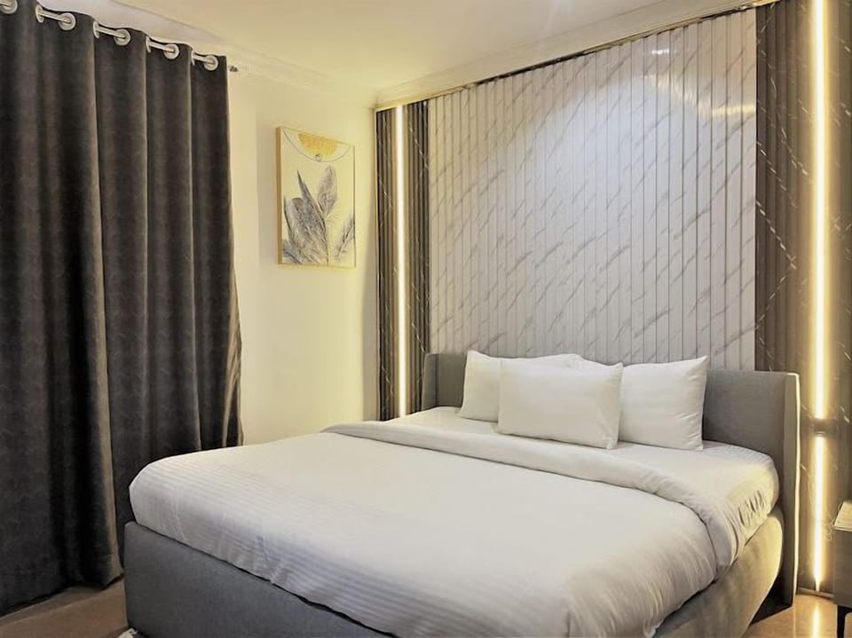 Deluxe Room, Balcony, City View | Desk, laptop workspace, free WiFi