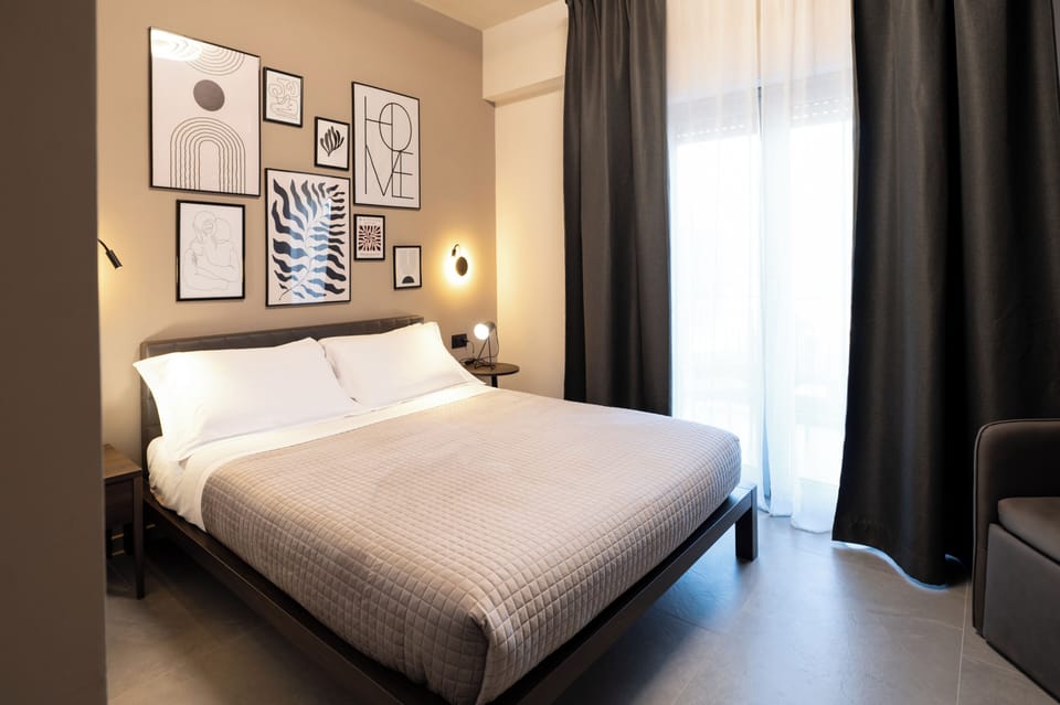 Comfort Room | Premium bedding, blackout drapes, iron/ironing board, free WiFi