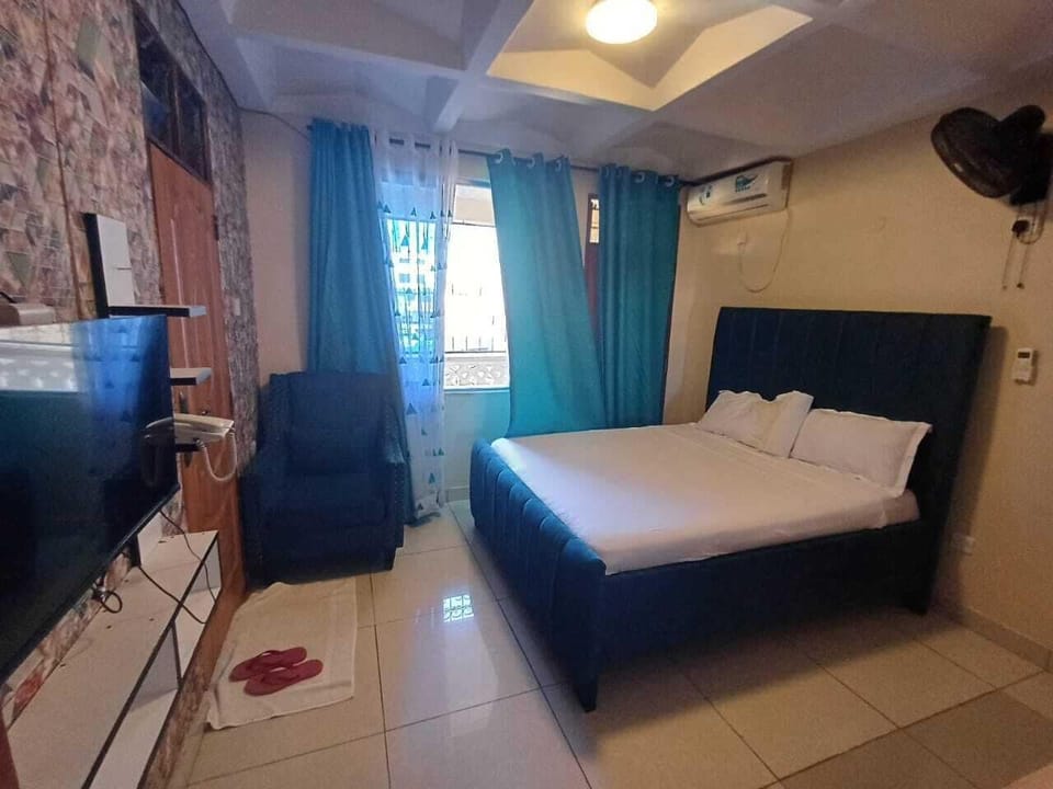 Deluxe Studio Suite, Balcony, City View | Living area | 32-inch Smart TV with digital channels, streaming services