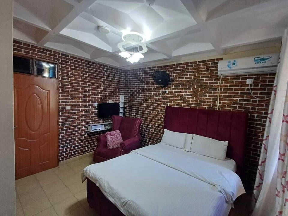 Deluxe Studio Suite, Balcony, City View | Premium bedding, desk, laptop workspace, blackout drapes