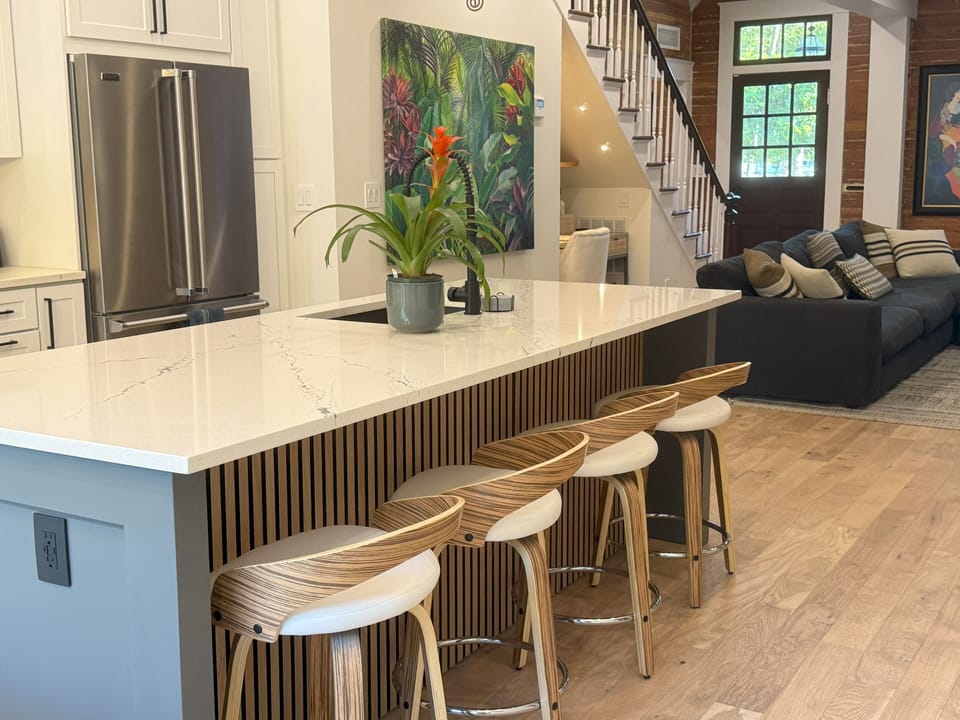 Bar stools provide additional seating as well as a place to socialize with chefs