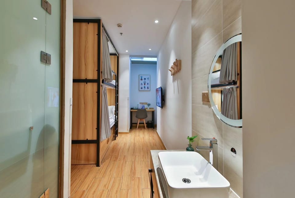 Shower, hair dryer, slippers, towels