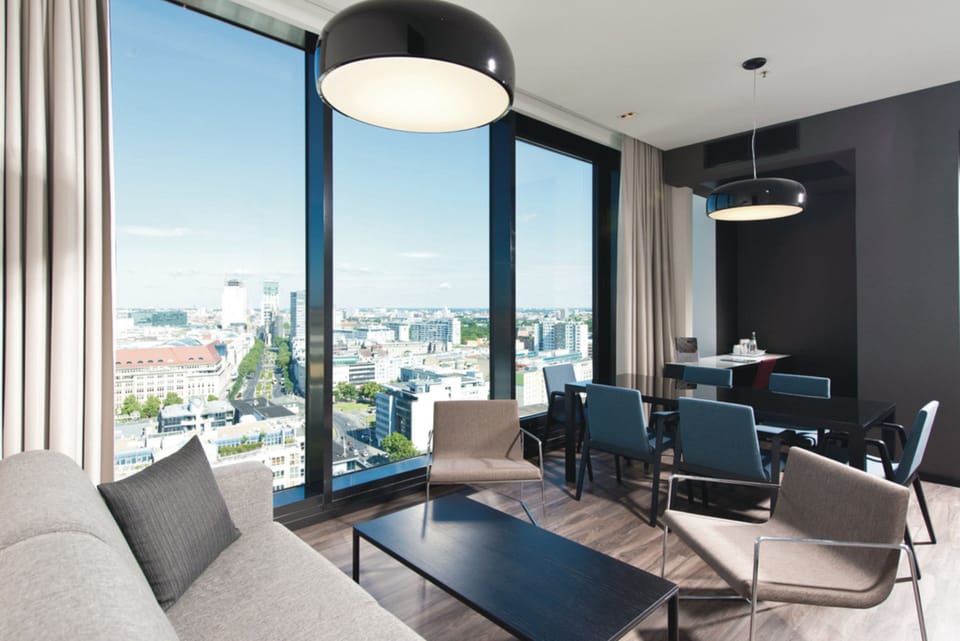 Presidential Suite (Berlin- Rooftop View) | Living area | TV