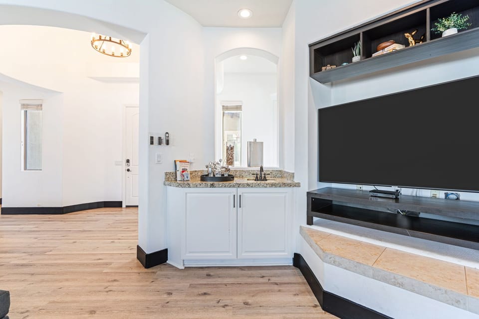 Villa, Mountain View | Living room | 65-inch Smart TV with cable channels, fireplace, video-game console