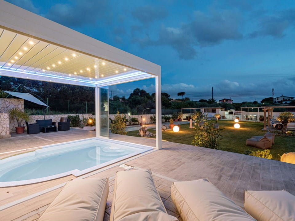 Sky, Cloud, Property, Water, Swimming Pool, Light, Shade, Lighting, Outdoor Furniture, Building