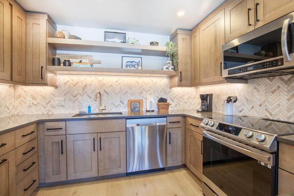 Granite counter tops, stainless steel appliances and all the gadgets you need