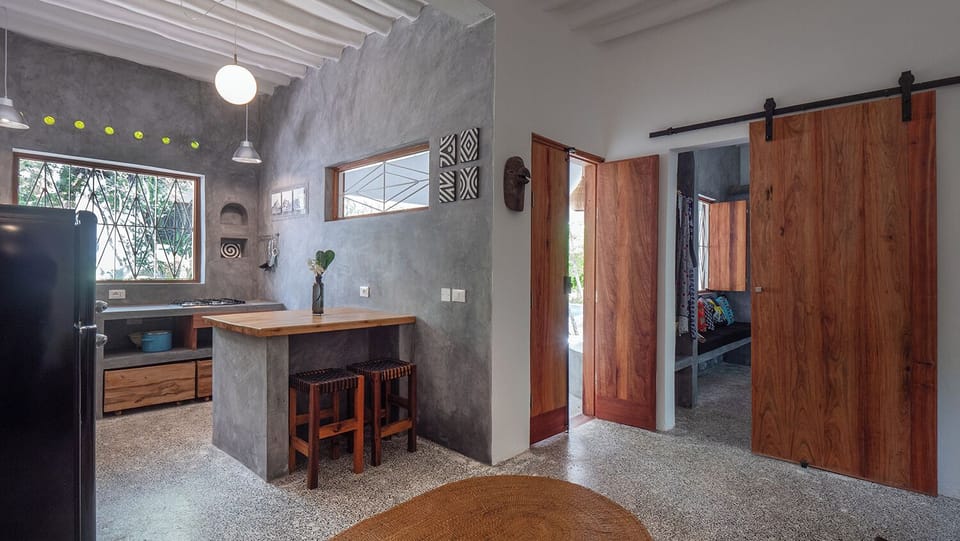 Superior Suite, Patio, Pool View | Private kitchenette | Toaster, freezer