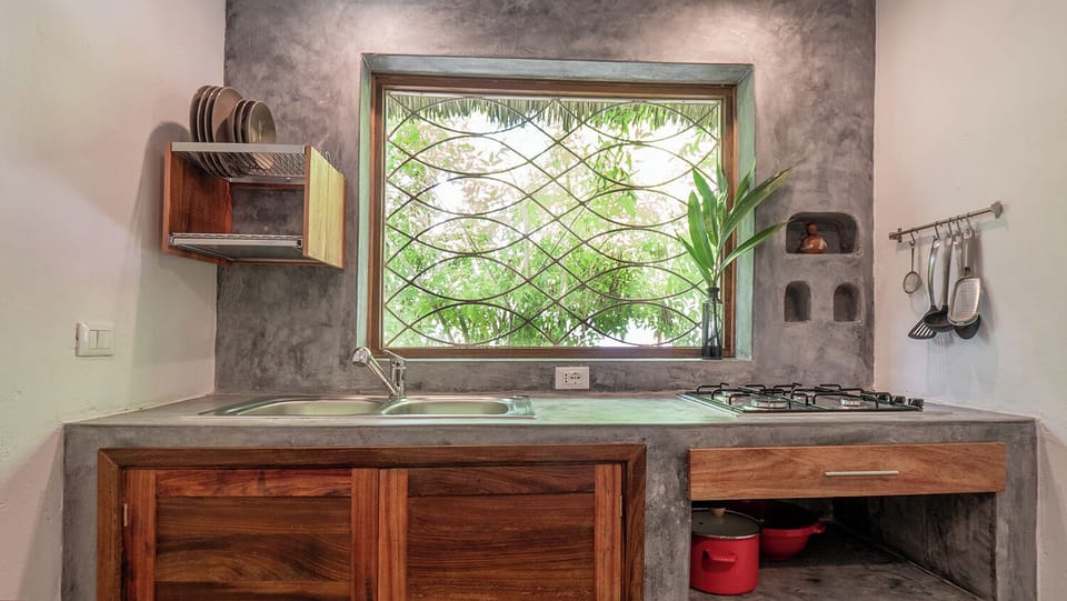 Superior Suite, Patio, Pool View | Private kitchen | Toaster, freezer