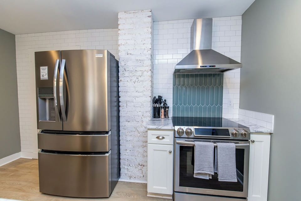 Renovated kitchen with all major appliances and supplies