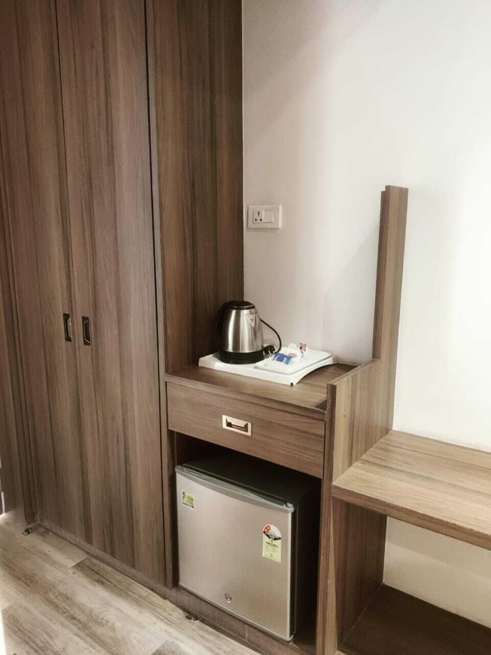 Luxury Suite, Pool View | Premium bedding, desk, laptop workspace, blackout drapes