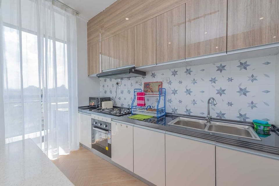 Luxury Apartment, Balcony, City View | Private kitchen | Fridge, microwave, cookware/dishes/utensils, dining tables