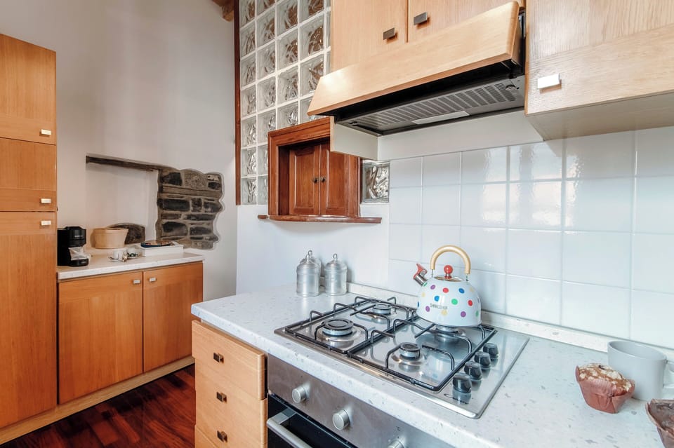 Apartment, City View | Private kitchen | Full-size fridge, oven, stovetop, espresso maker
