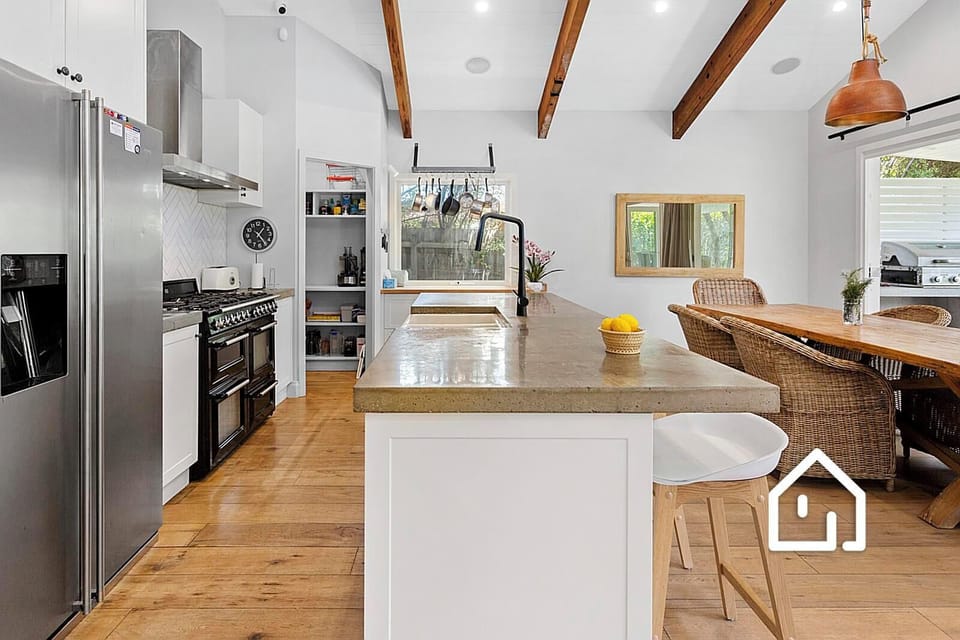 Well-equipped entertainer’s kitchen with quality Smeg appliances