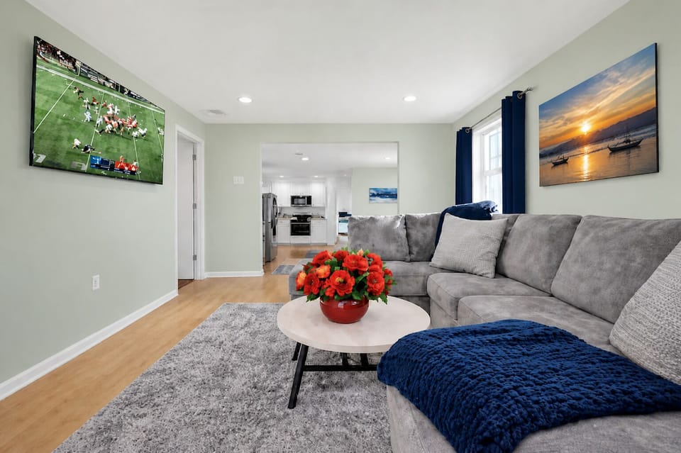 Spacious Living room. Plush couch. Central AC/ Heating . 65 " Smart TV.