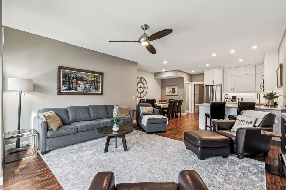  Open concept living space of living room, kitchen and dining area. 