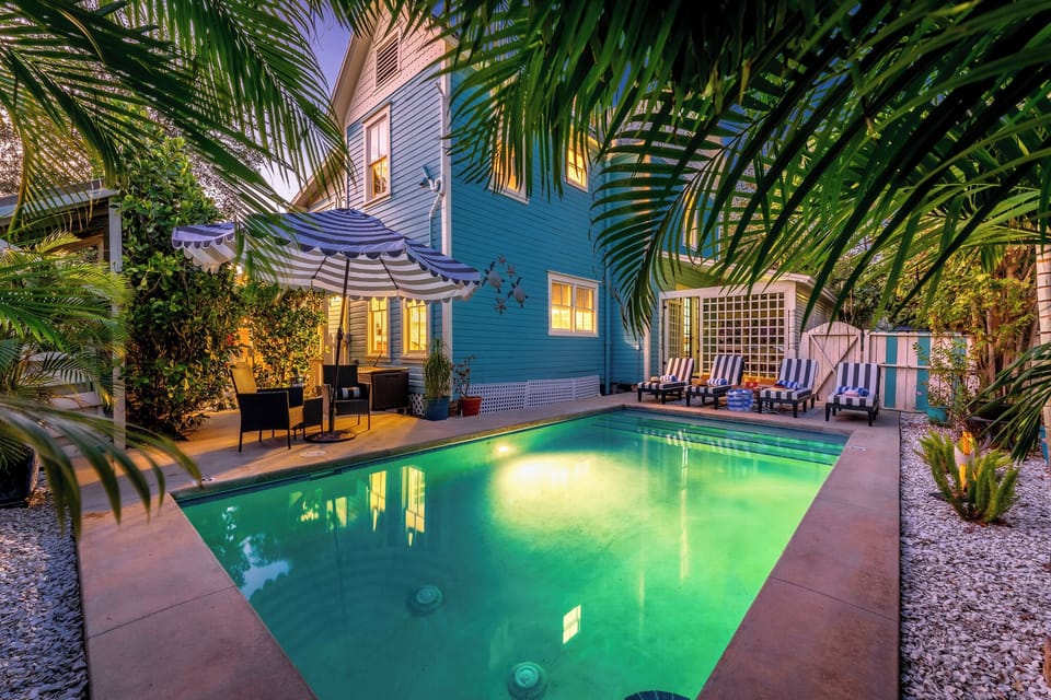 Evenings by the pool are magical, with the glow of the water and cozy ambiance of soft lighting. A perfect setting for winding down your day.