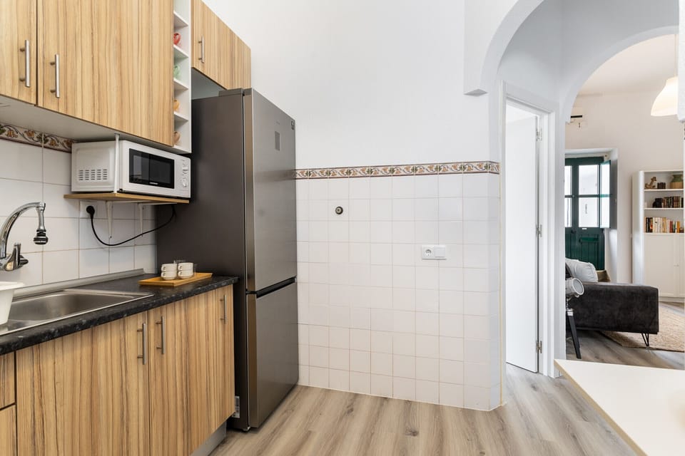 Kitchen with appliances and storage space