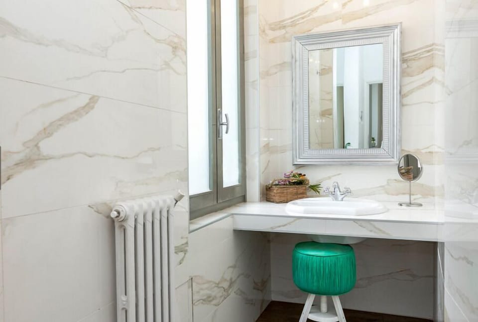 Shower, eco-friendly toiletries, hair dryer, slippers