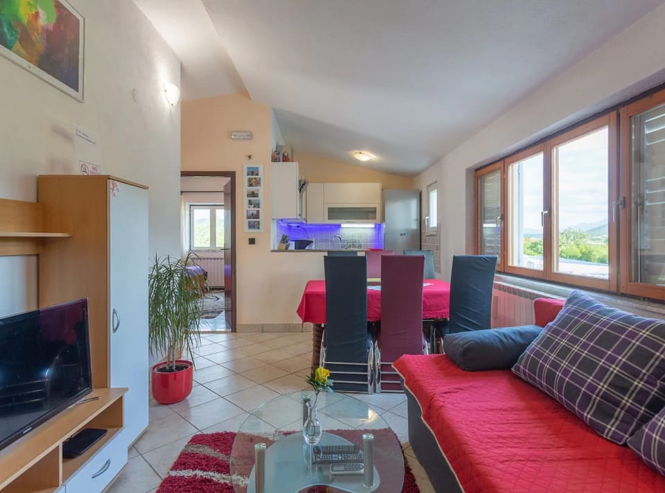 House (Four Bedroom Holiday Home with Pool a) | Living room | 32-inch flat-screen TV with cable channels, foosball, table tennis