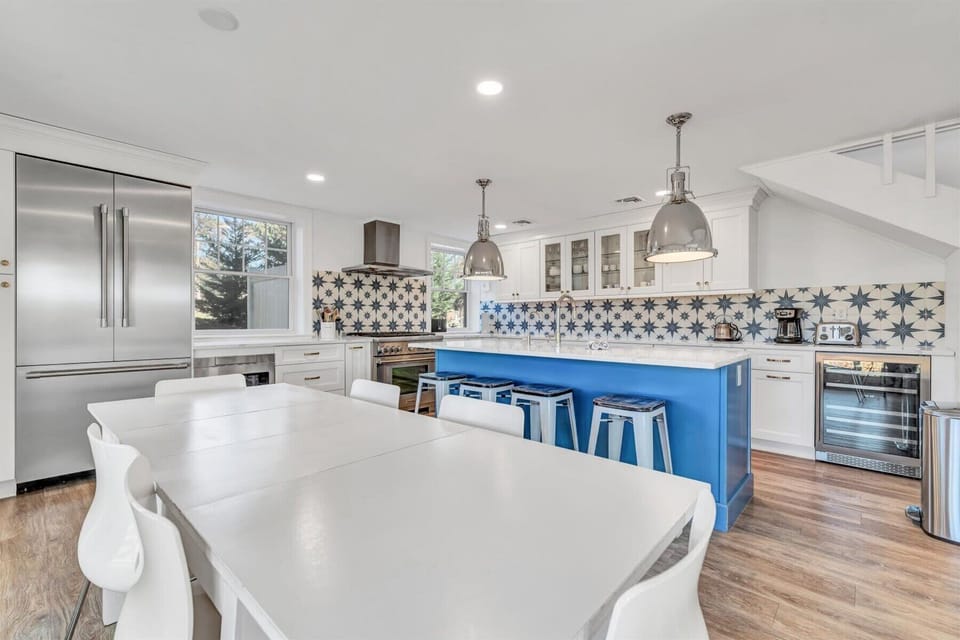 Our kitchen is fully equipped, boasting inviting bar seating for relaxed dining.