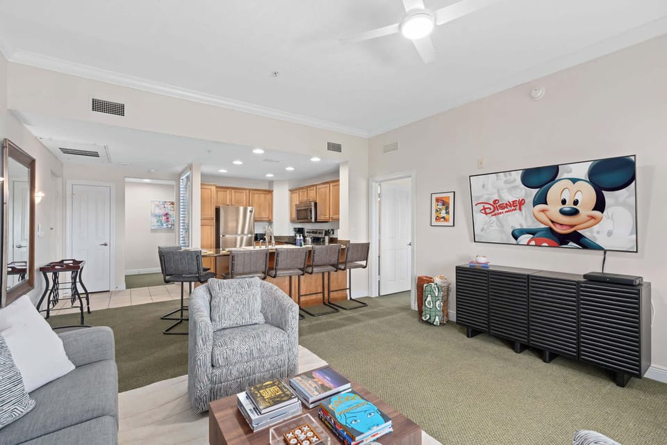 Spacious open-concept living, dining, and kitchen area.
