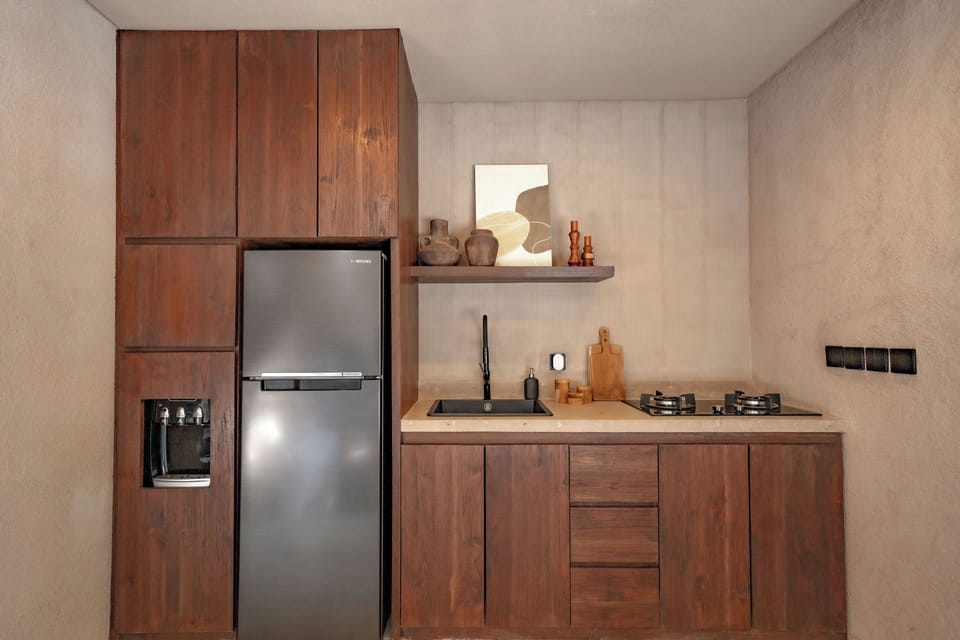Junior Villa, Pool View | Private kitchen | Fridge, stovetop, blender, cookware/dishes/utensils