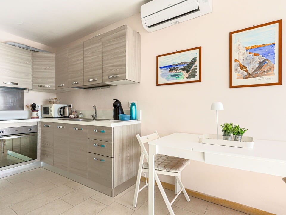 Furniture, Interior Design, Wood, Flooring, Cabinetry, Kitchen, Major Appliance, Floor, Kitchen Appliance, Countertop