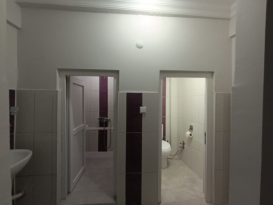Family Room, Multiple Bedrooms, Balcony, City View | Bathroom | Shower, rainfall showerhead, hair dryer, towels