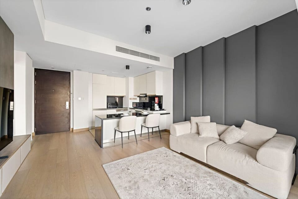 Living Room: Chic space with sleek furnishings, natural light, and a view to inspire your adventures!
