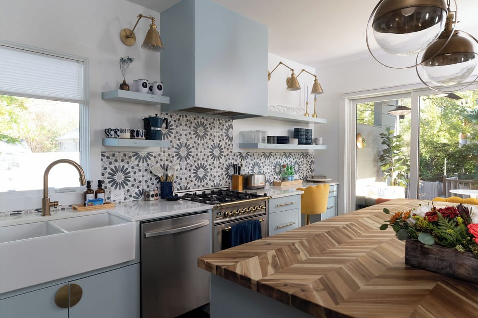 Fully stocked kitchen with stainless steel appliances, perfect for cooking at home.