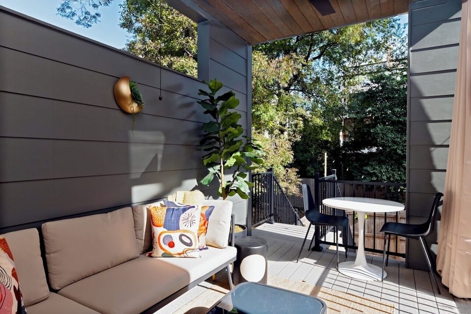 Outdoor Lounge: Stylish sectional and bistro table for relaxing mornings and evening wine outdoors