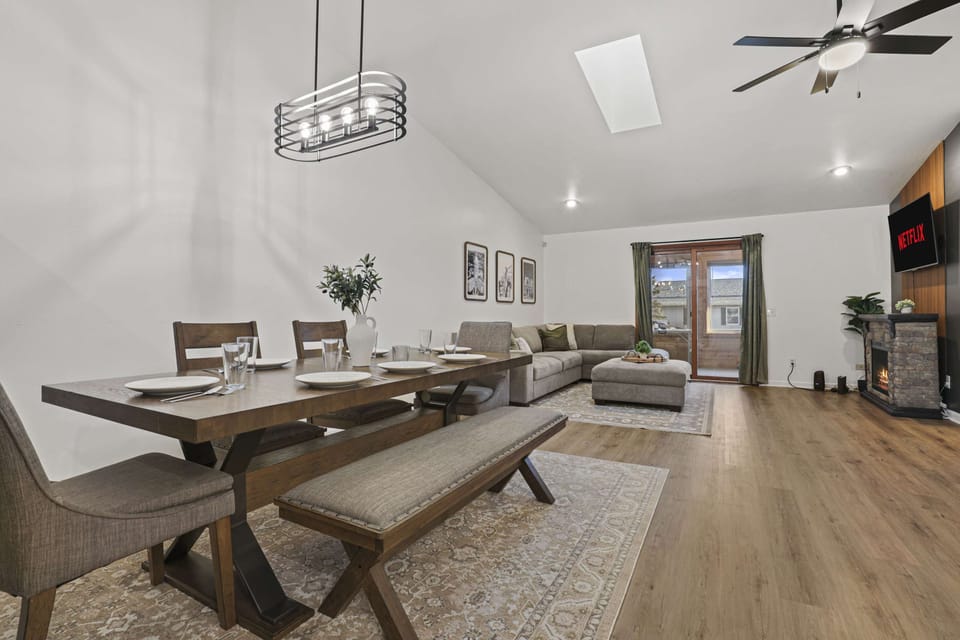 7 person dining table that has room to pull up a couple more chairs