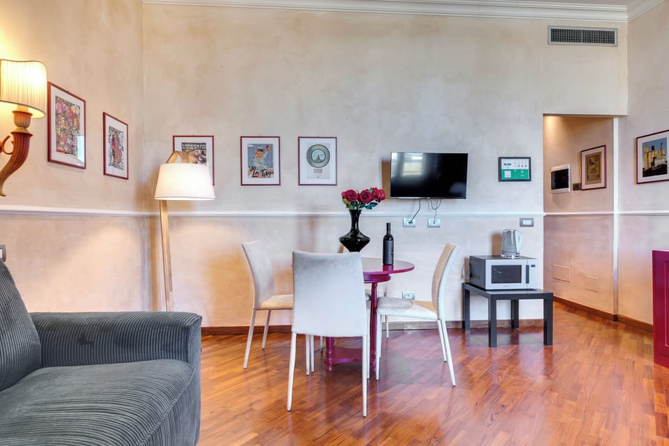 Apartment | Living area | 24-inch flat-screen TV with digital channels
