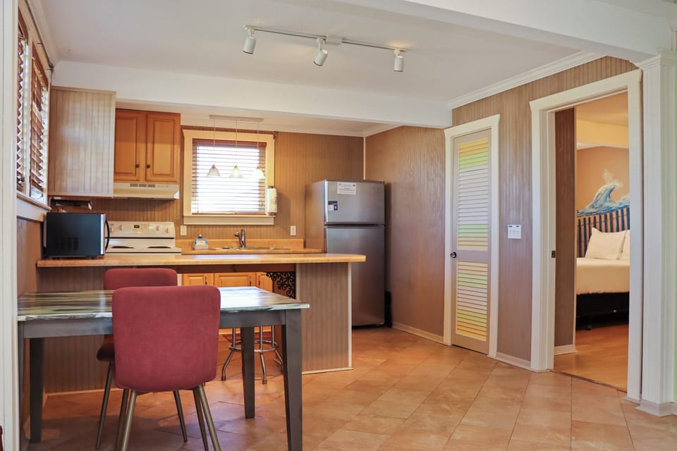 Dining Area, Kitchen and Bedroom 2