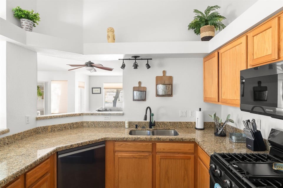 Perfect for extended stays, the kitchen includes cookware, dishes, appliances, and everything needed to settle in comfortably.