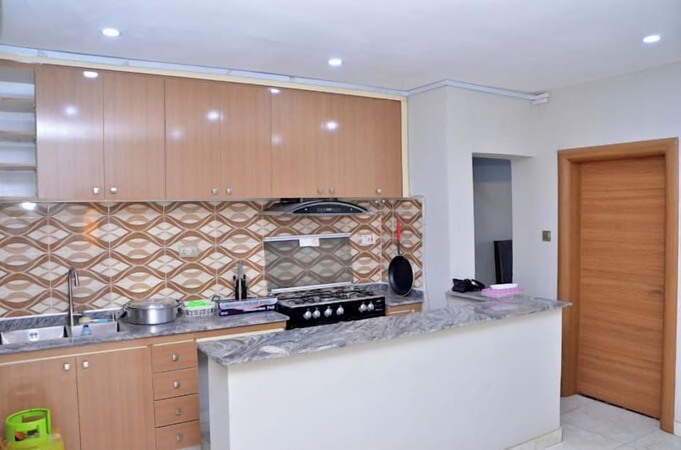 Family Room, Balcony, City View | Private kitchen | Mini-fridge
