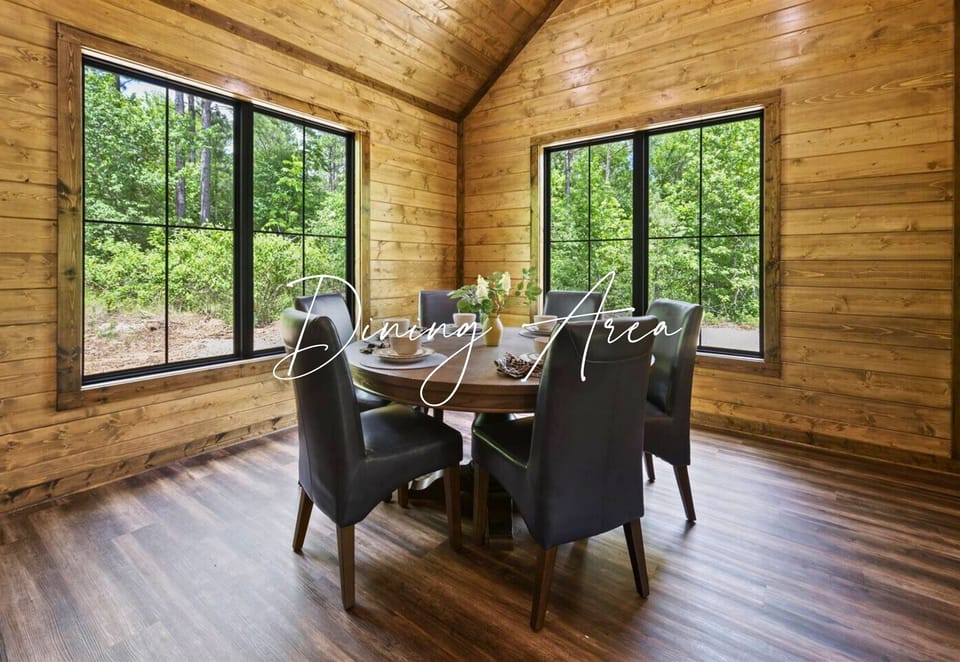 Gather around the table in our intimate dining area, where every meal is framed by the tranquil views of the woods. It's not just dining, it's an experience.