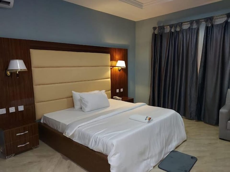 Deluxe Room, Balcony, City View | Desk, laptop workspace, free WiFi
