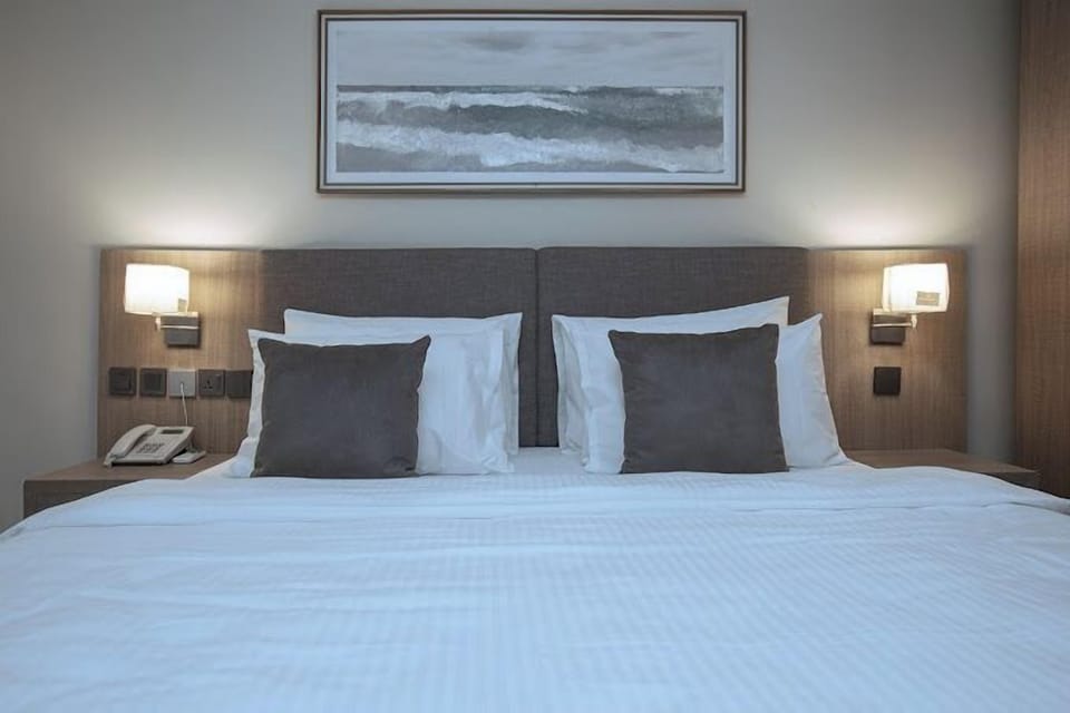 Family Room, Balcony, City View | Desk, laptop workspace, free WiFi