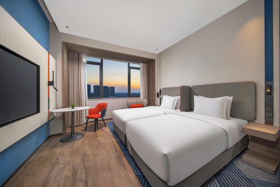 Premium bedding, down comforters, blackout drapes, soundproofing