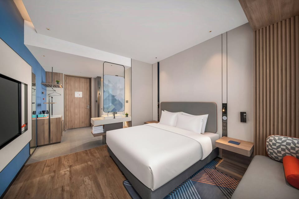 Premium bedding, down comforters, blackout drapes, soundproofing
