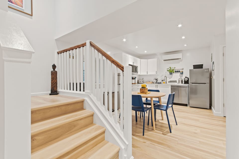 Bright modern kitchen with dining for 4 and stylish open layout